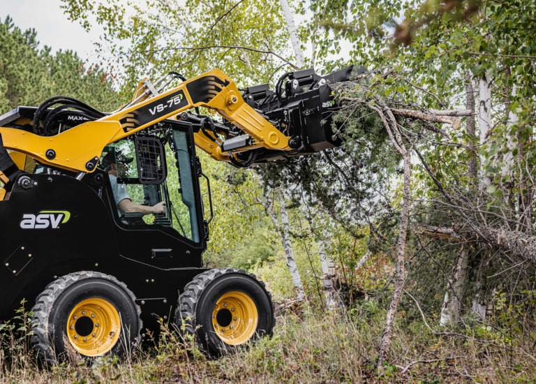 VS-75 Skid Steer with grapple attachment
