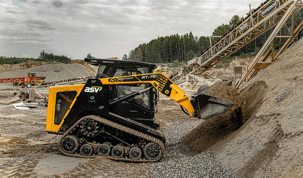 track loader with dirt